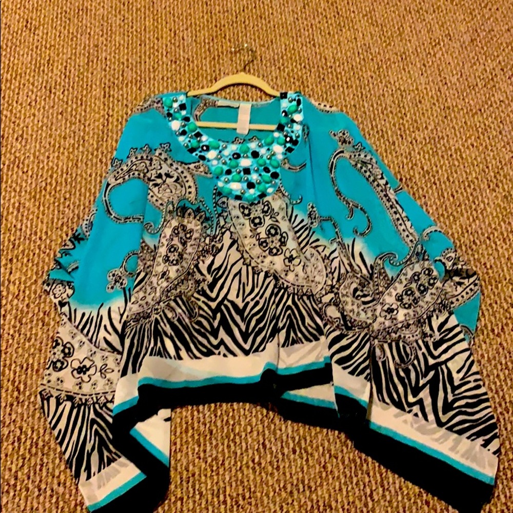 Beautiful cape/bathing suit cover